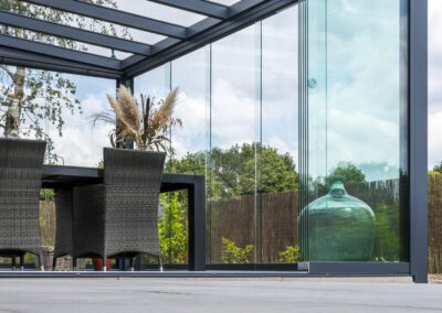 Veranda With Glass Roof and Sliding Glass Doors