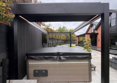 Side view of pinela deluxe garden pergola retracted open